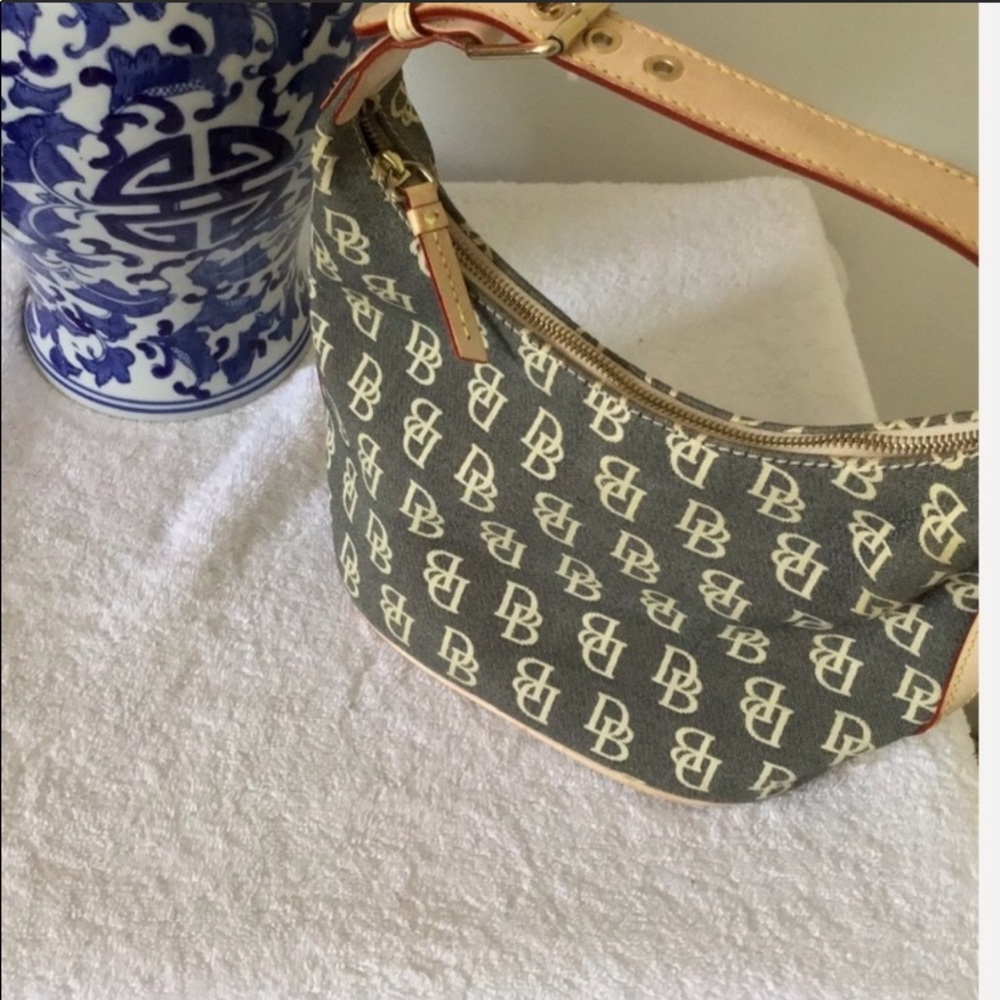 Small grey/cream Dooney and Bourke bag.